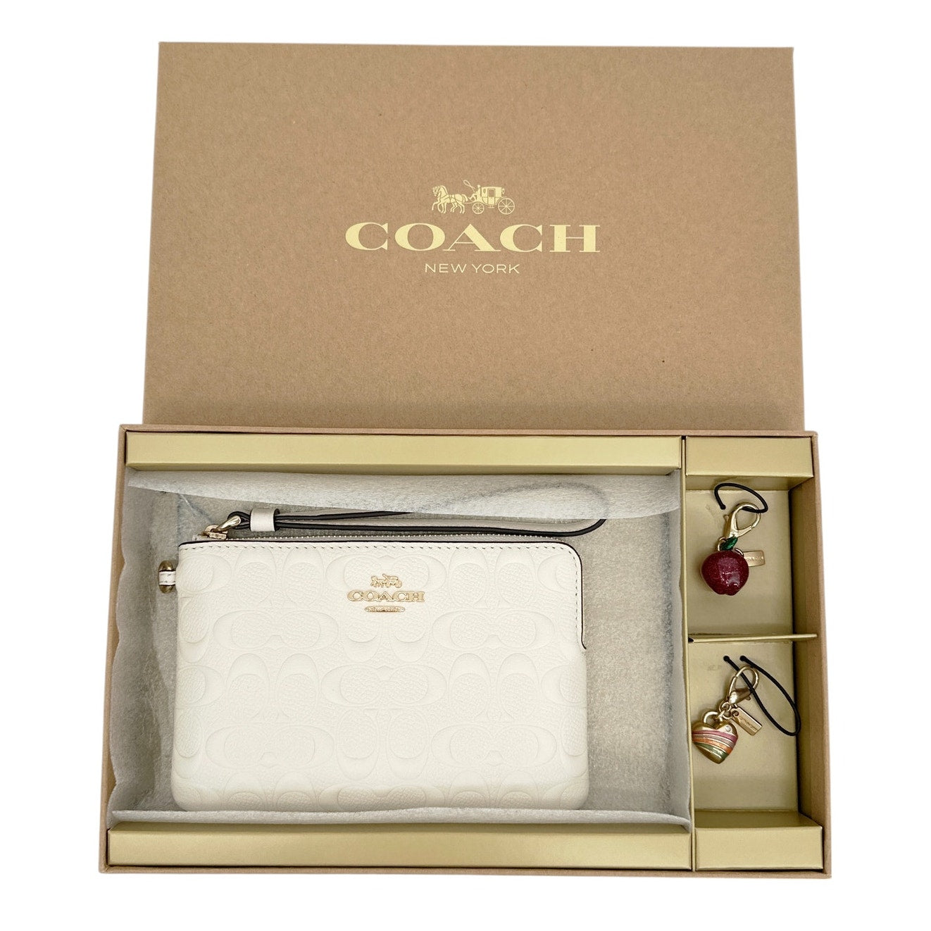 COACH Corner Zip Wristlet in Signature Leather
