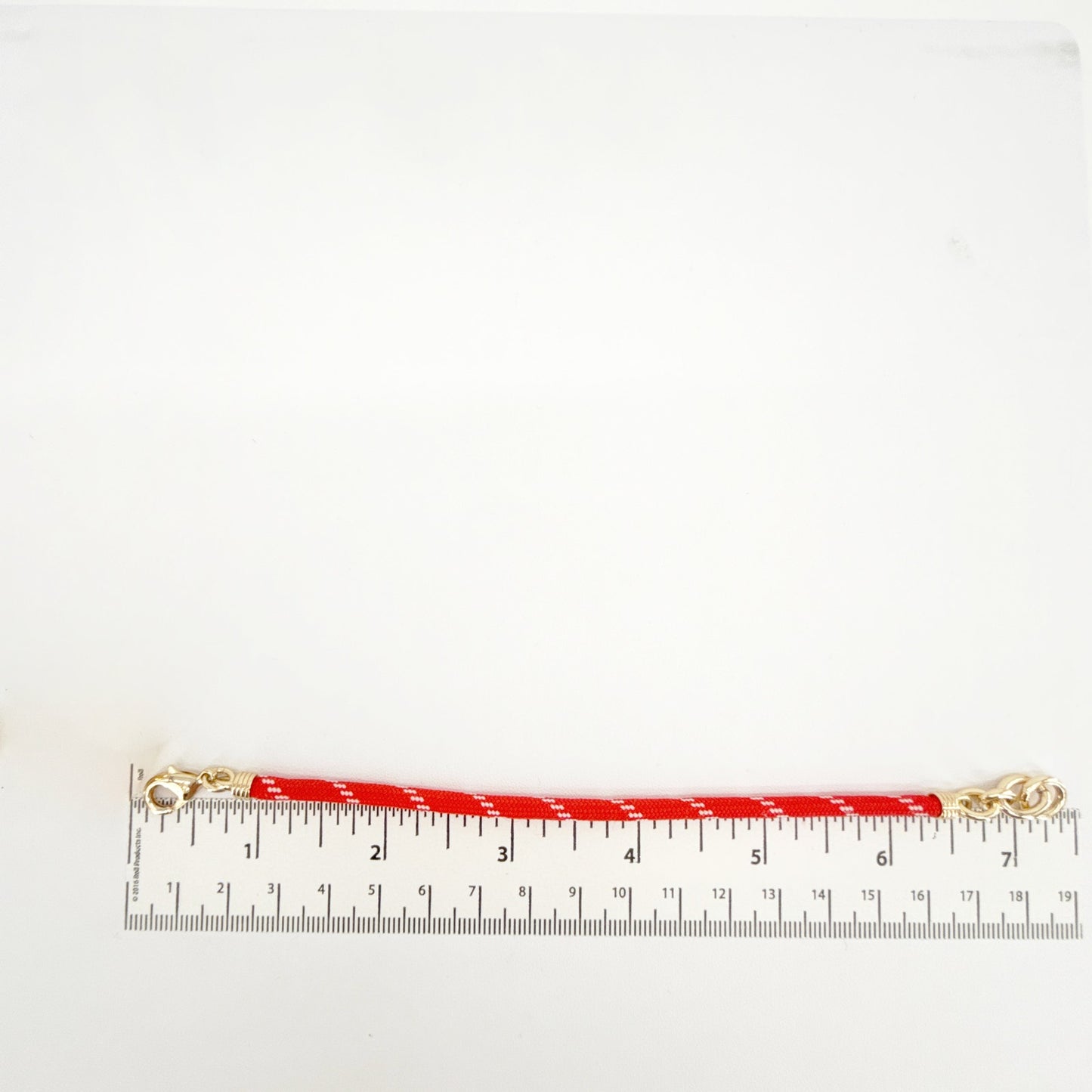 ROXANNE ASSOULIN The Cord Charm Bracelet in Red