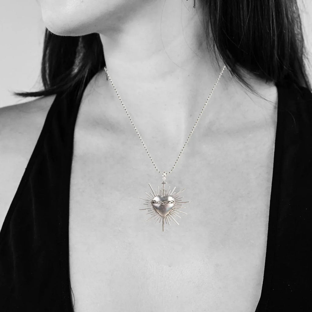VIRGINS SAINTS & ANGELS VSA Sacred Flame Charm in Silver - flyKAMP