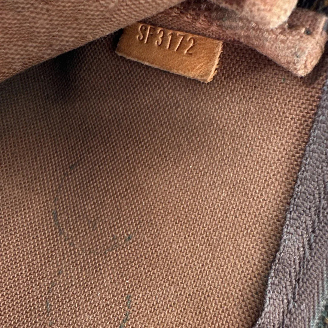 LOUIS VUITTON Pochette Accessoires Monogram Canvas Mini - flyKAMP