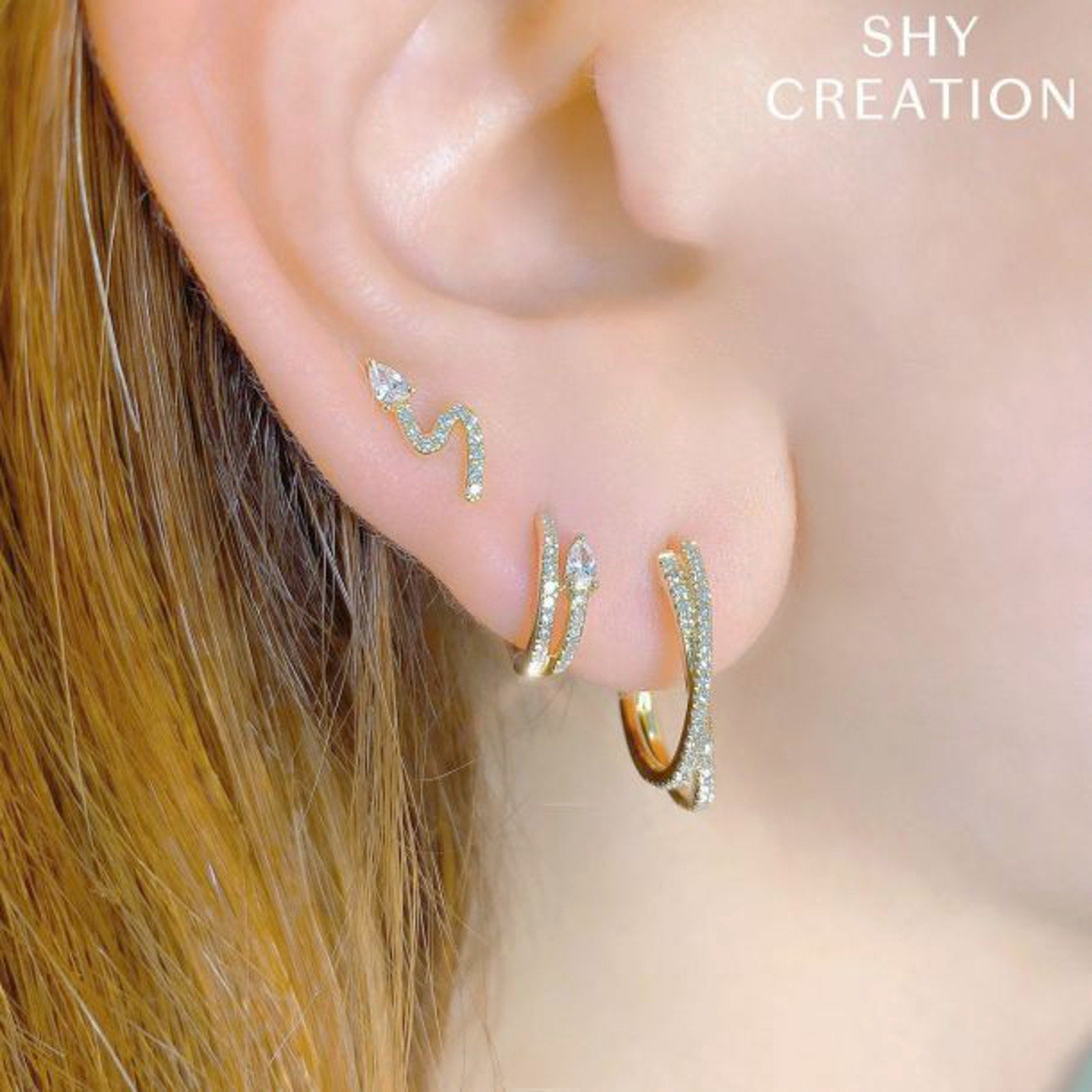 SHY Creation Diamond 14K Yellow Gold Crossover Hoop Earrings .21 CTW Shy Creation