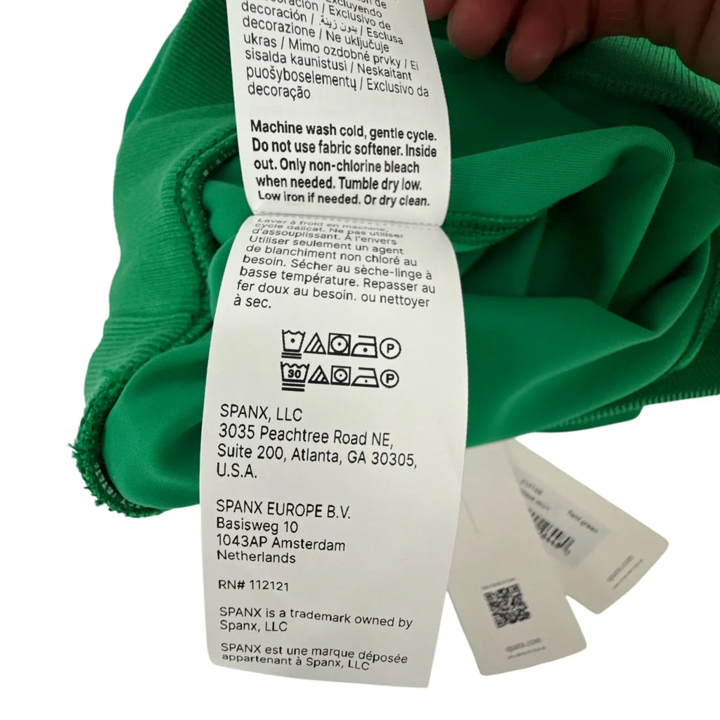 SPANX AirEssentials® Pique Skort in Field Green XS - flyKAMP