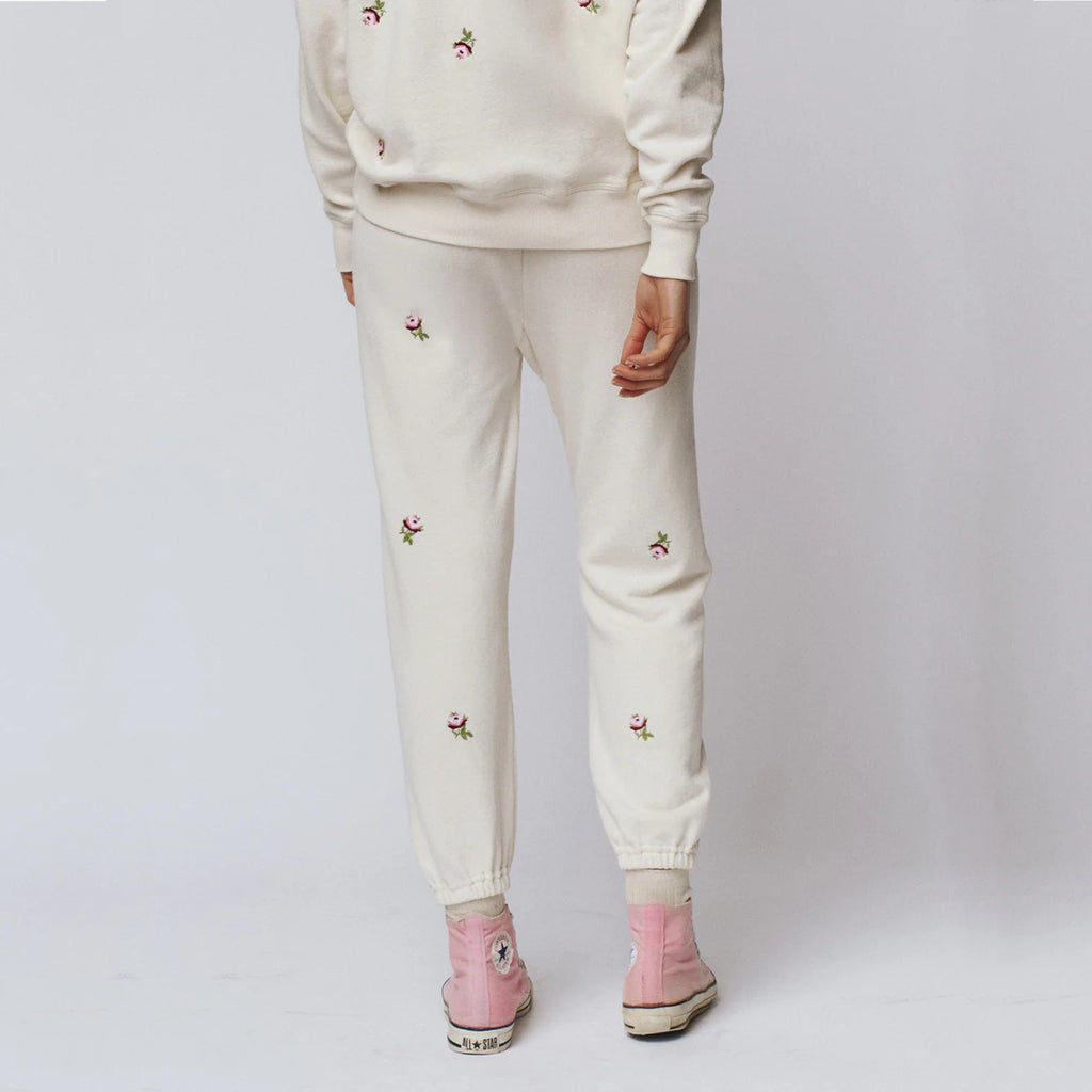 THE GREAT. The Stadium Sweatpant. Washed White with Embroidered Roses 1|S The Great.
