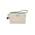 COACH Corner Zip Wristlet in Signature Leather Coach