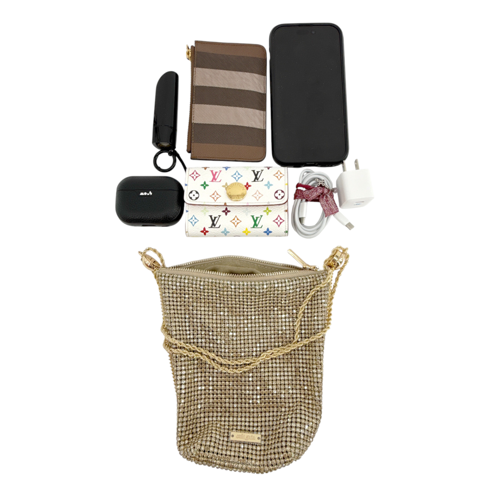 CULT GAIA Rue Wristlet Bag in Sand Dollar Cult Gaia