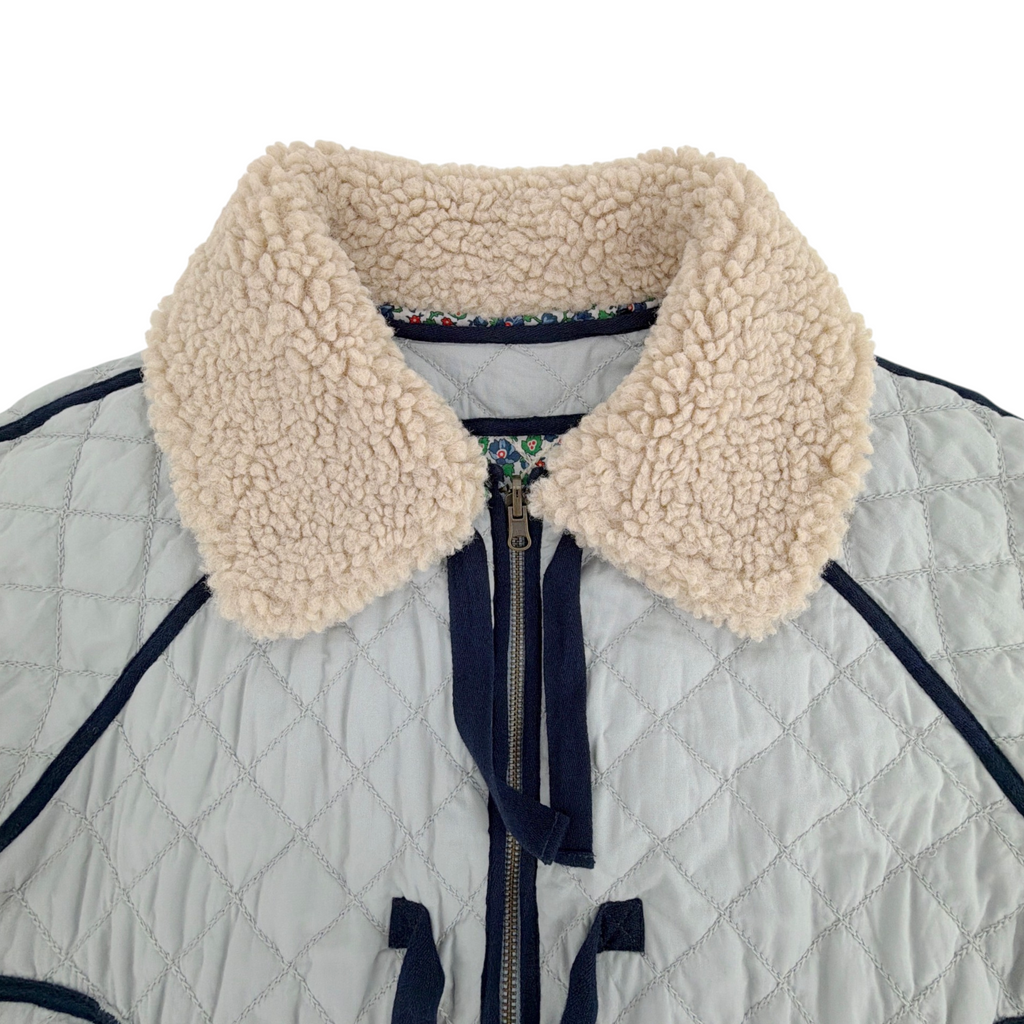 THE GREAT. The Short Quilted Reversible Jacket in Stone Blue 0|XS The Great.