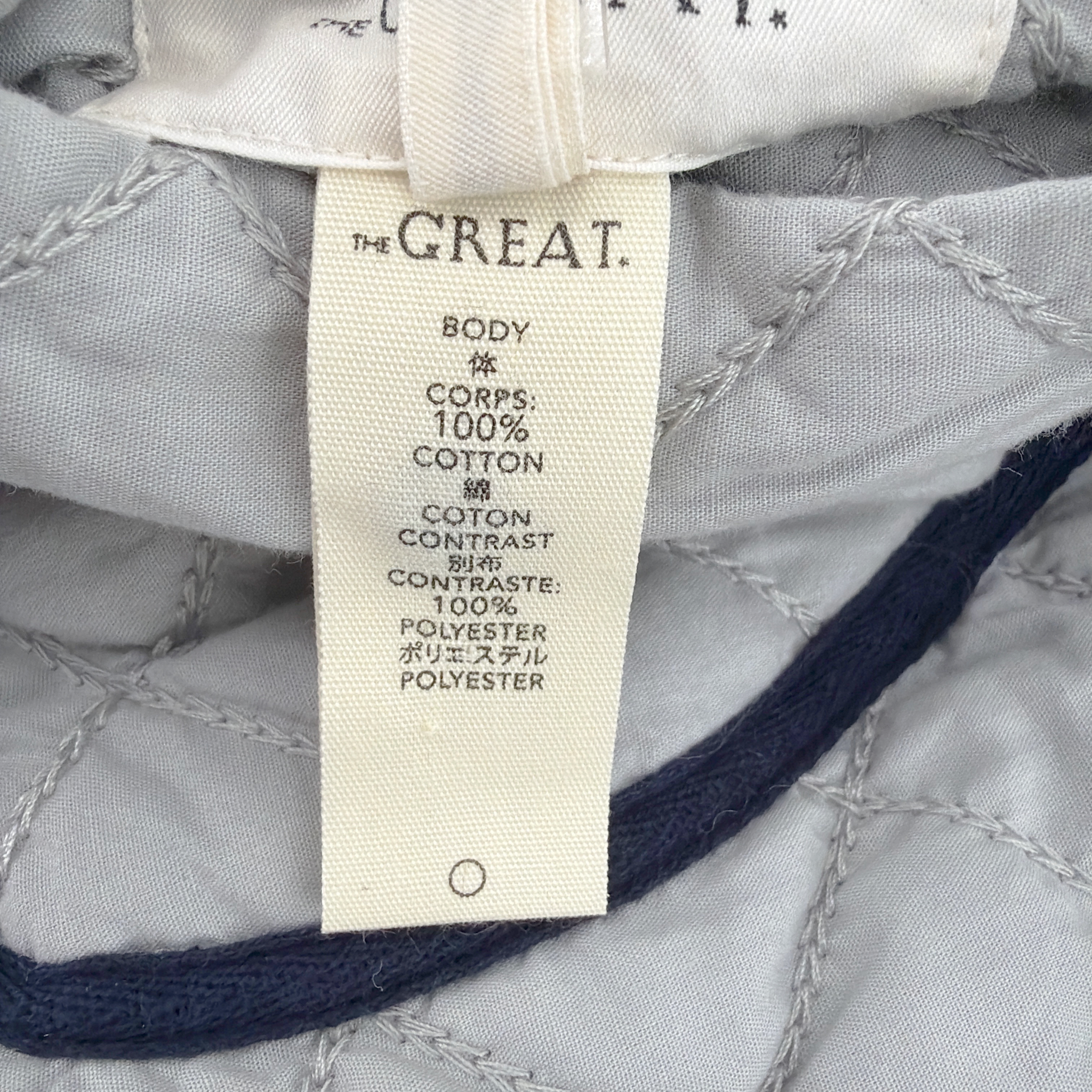 THE GREAT. The Short Quilted Reversible Jacket in Stone Blue 0|XS The Great.