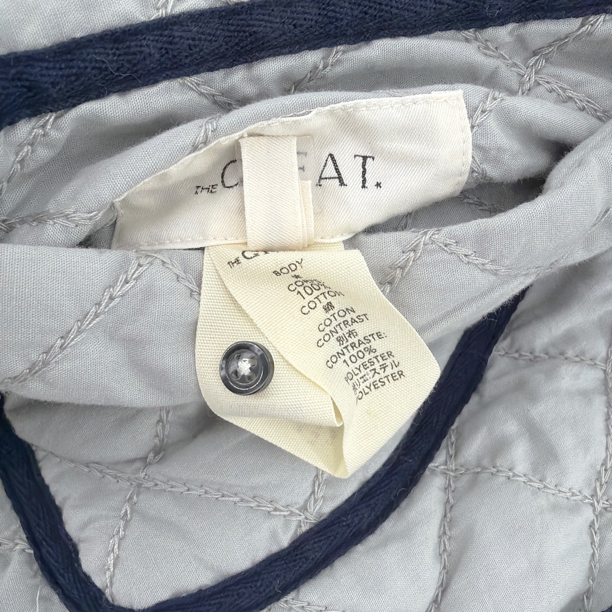 THE GREAT. The Short Quilted Reversible Jacket in Stone Blue 0|XS The Great.