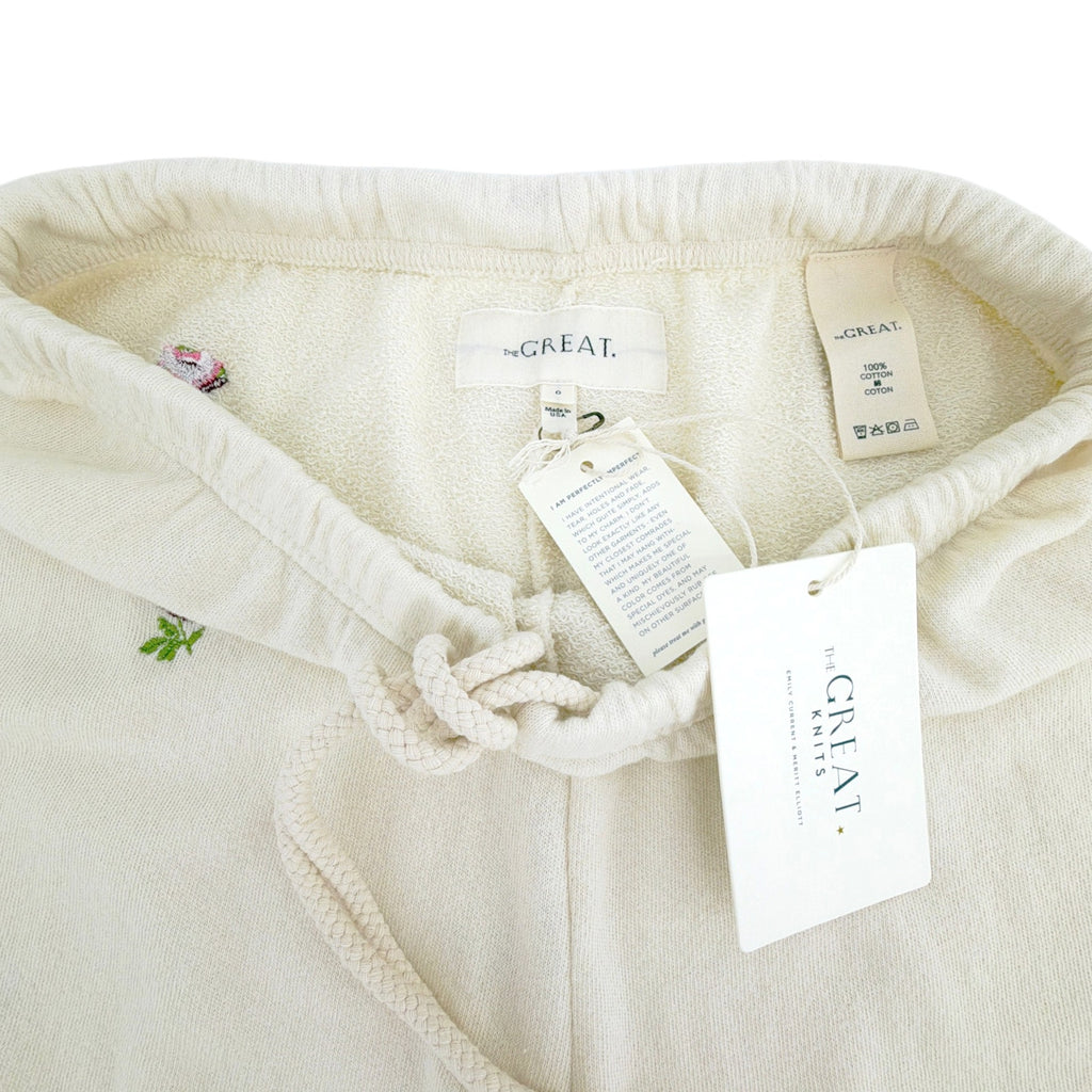 THE GREAT. The Stadium Sweatpant. Washed White with Embroidered Roses 0|XS The Great.